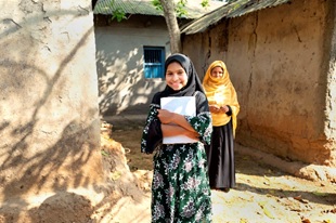 Takmina Akter in her village.